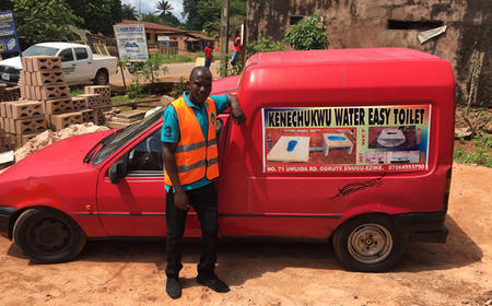 Business owner, Mr Kenechukwu, with his new delivery truck.
